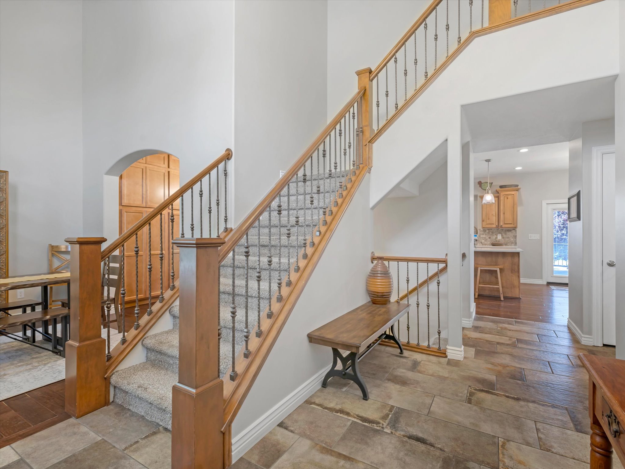 Foyer and entryway with a staircase to the upper floor.