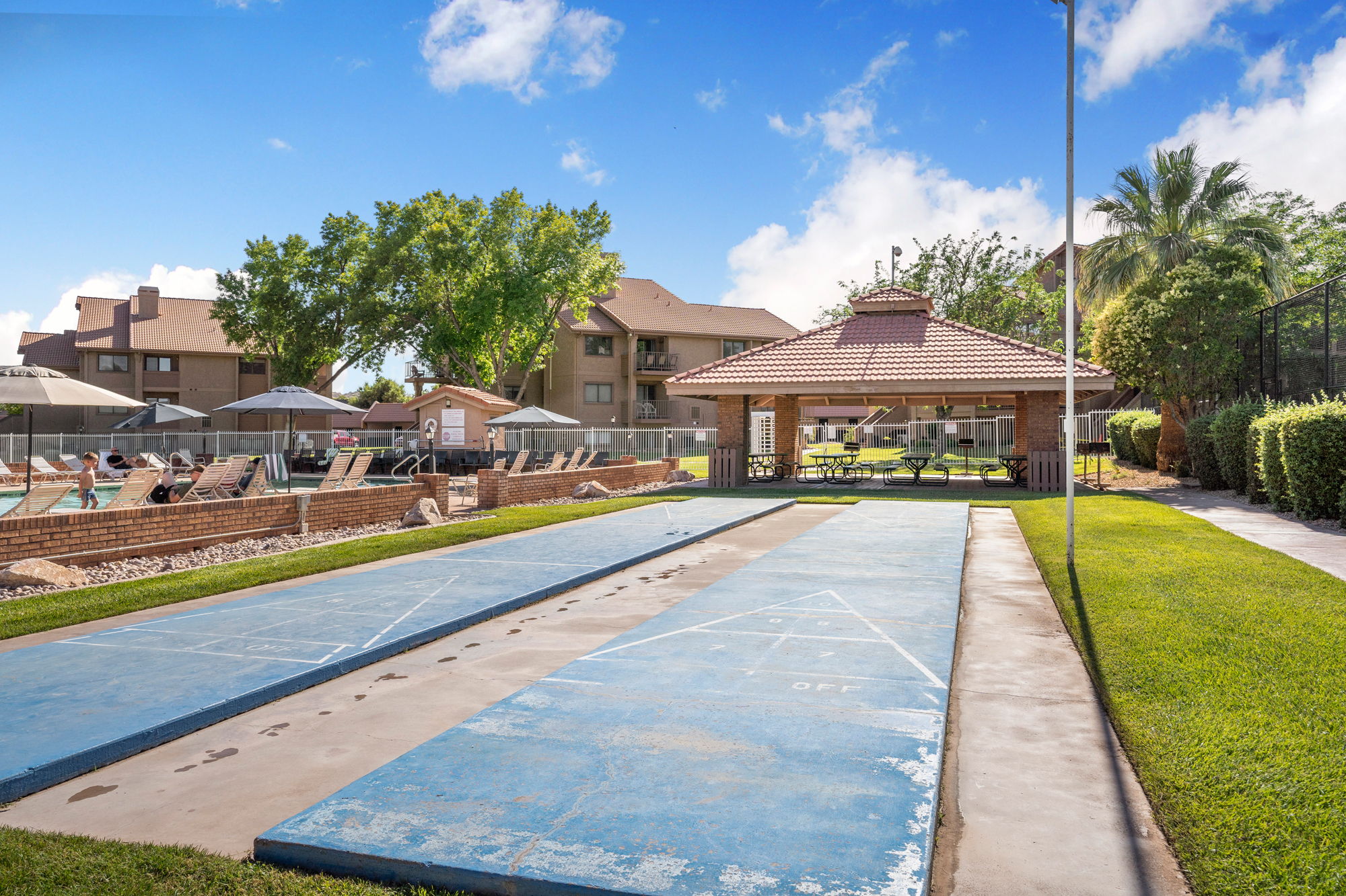 Shuffleboard courts with a shaded pavilion