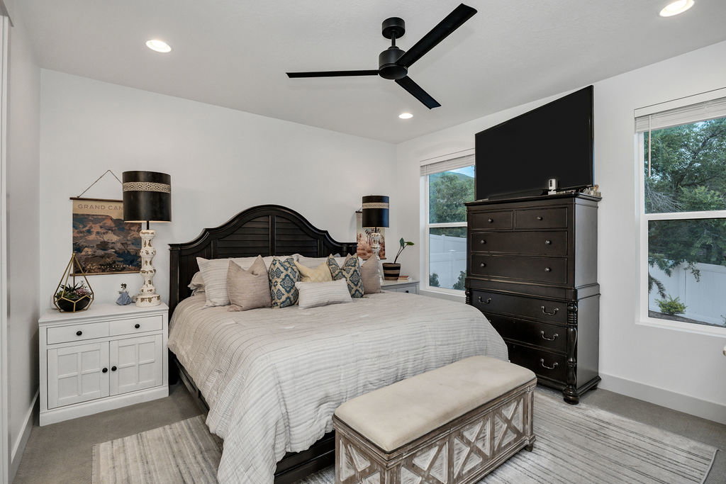 Bedroom featuring recessed lighting and a ceiling fan