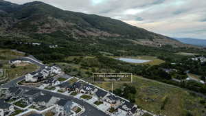Aerial perspective highlighting a residential development with mountain backdrop