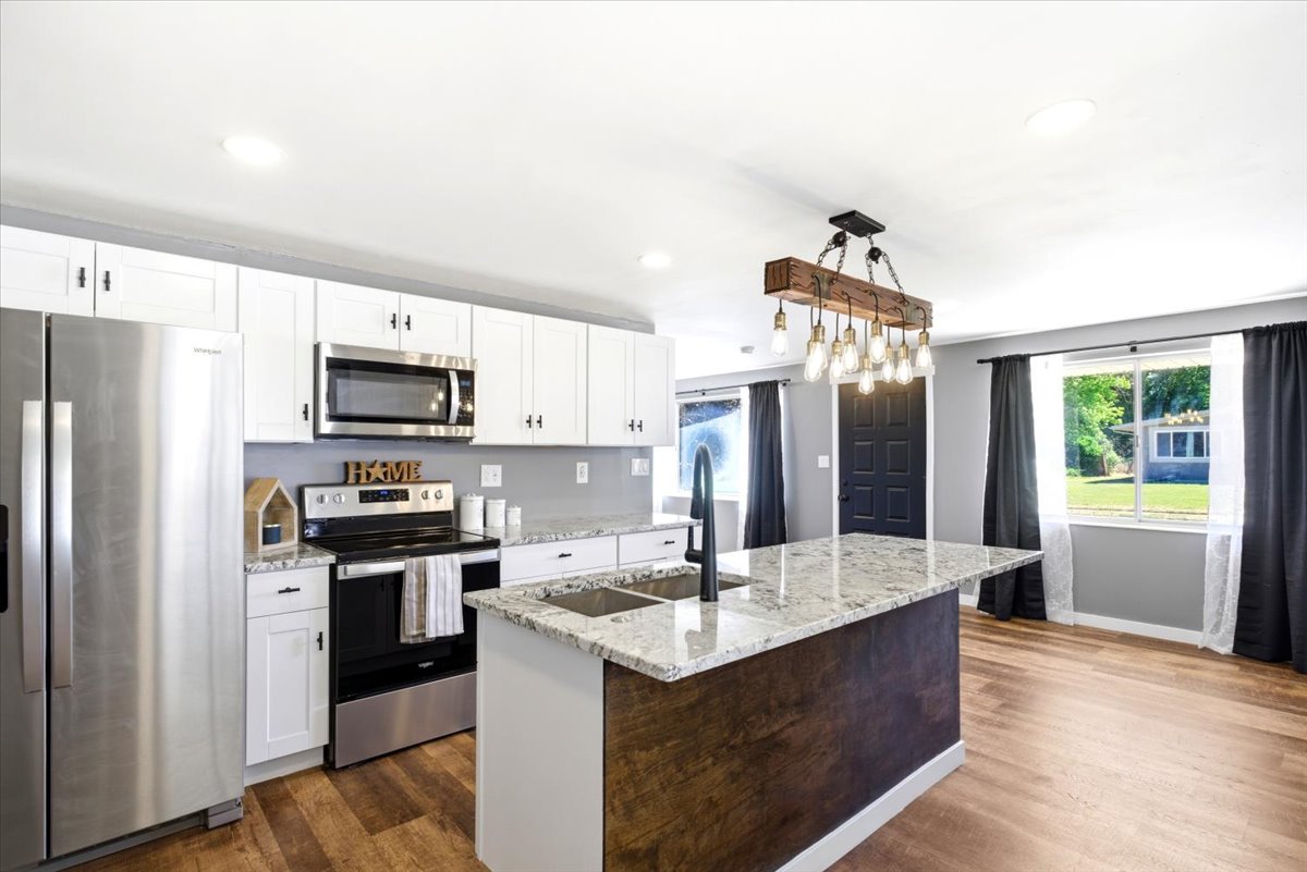 Beautiful updated kitchen with appliances to stay with the home. Appliances to stay with home.  Gas is ran in the crawl space to the approximate location of kitchen and laundry room.