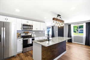 Beautiful updated kitchen with appliances to stay with the home. Appliances to stay with home.  Gas is ran in the crawl space to the approximate location of kitchen and laundry room.