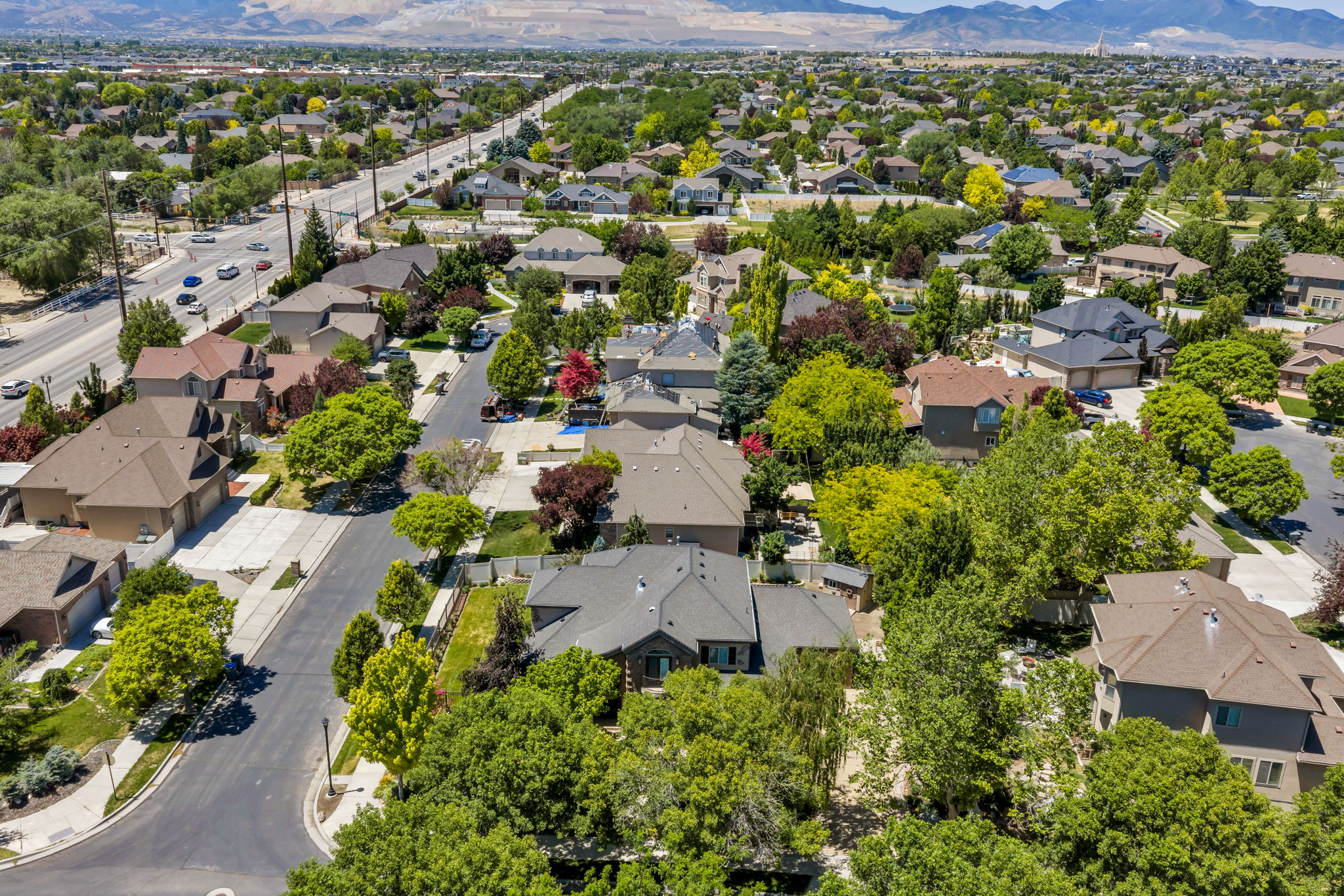 Expansive aerial capture showcasing a residential area with varied home architectural styles
