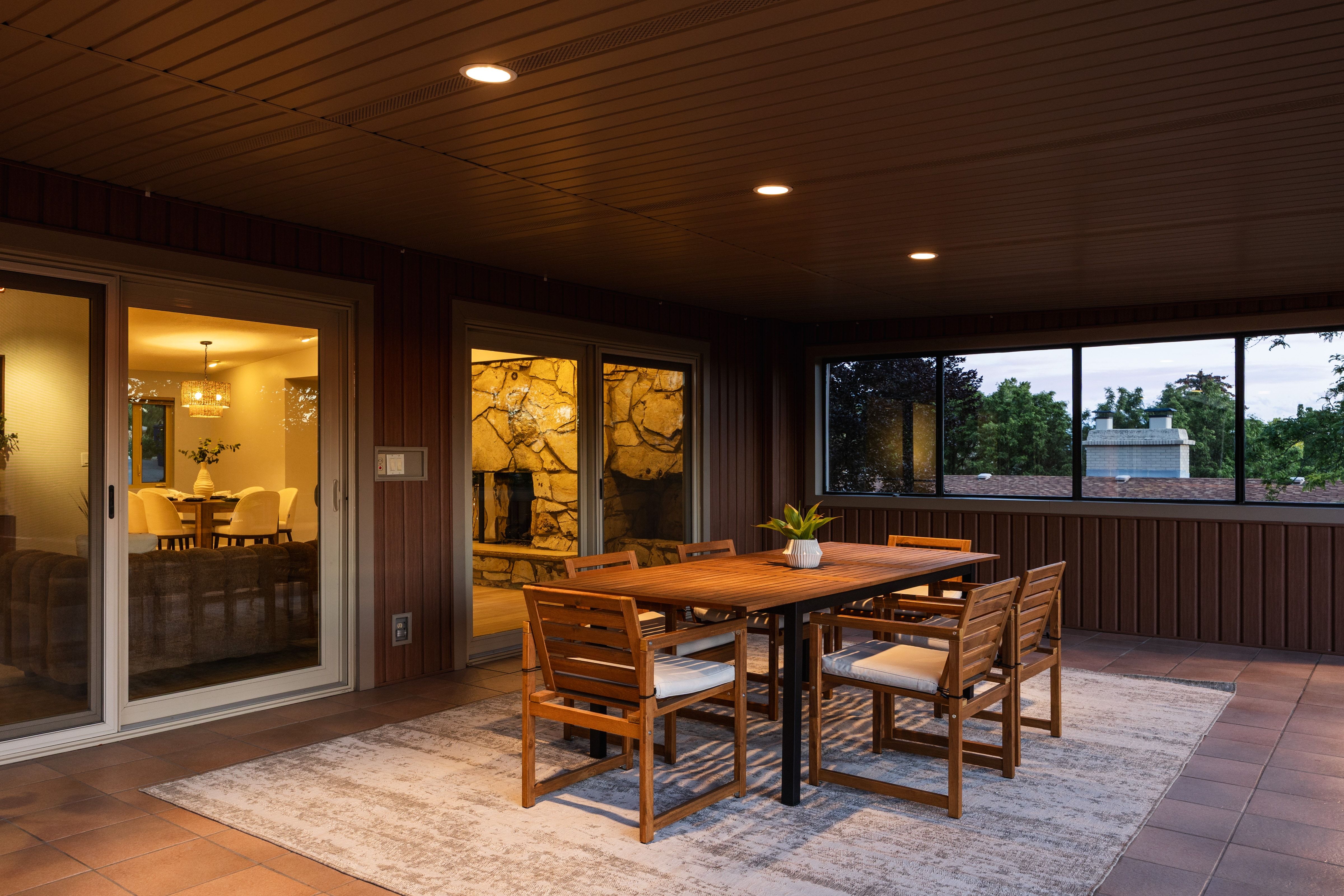 Covered patio featuring recessed lighting