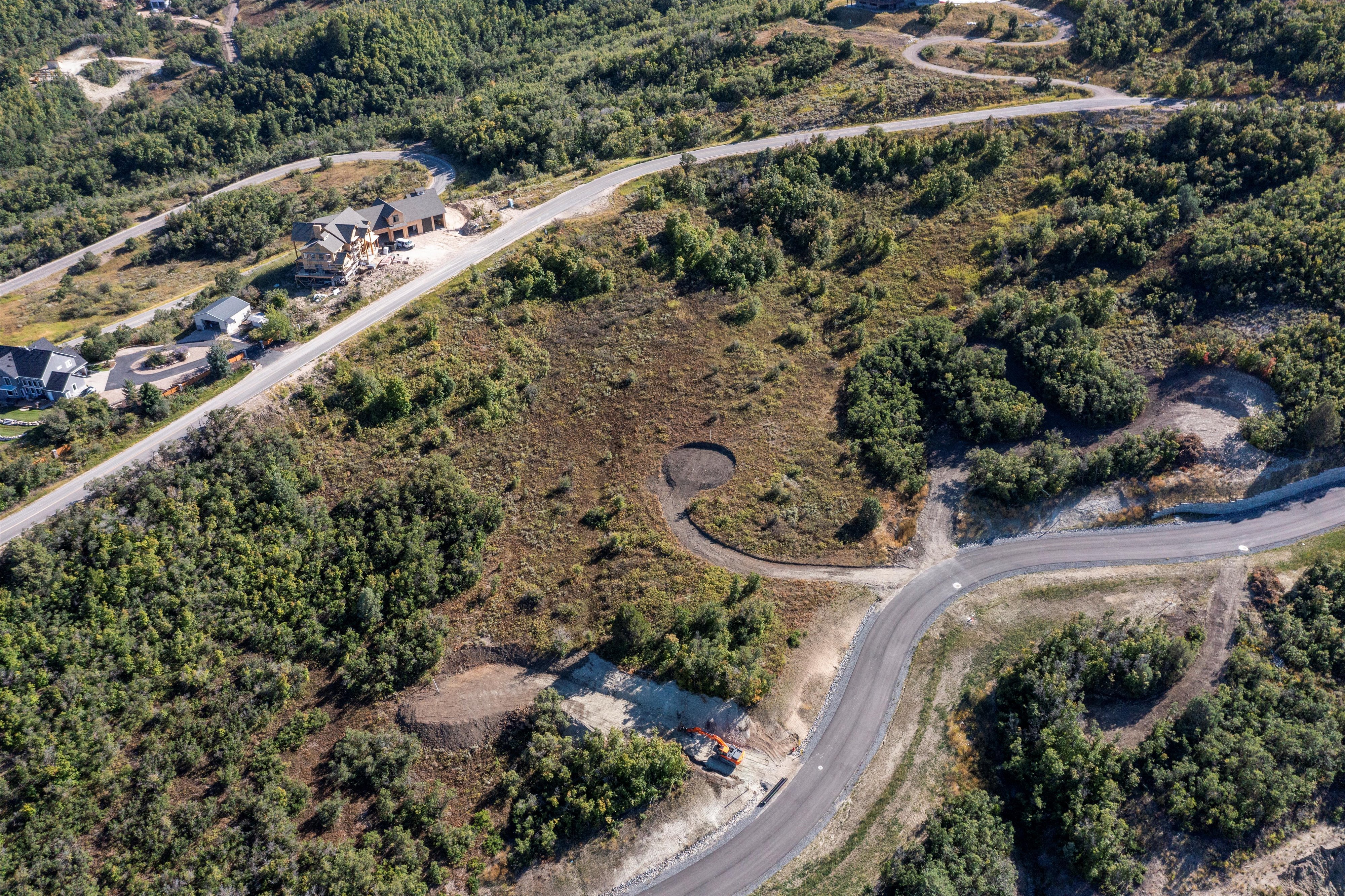 Developing property with paved road access and established infrastructure