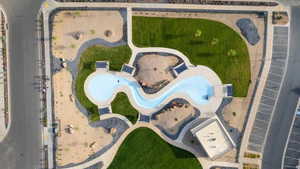 Central water feature with contoured concrete surround