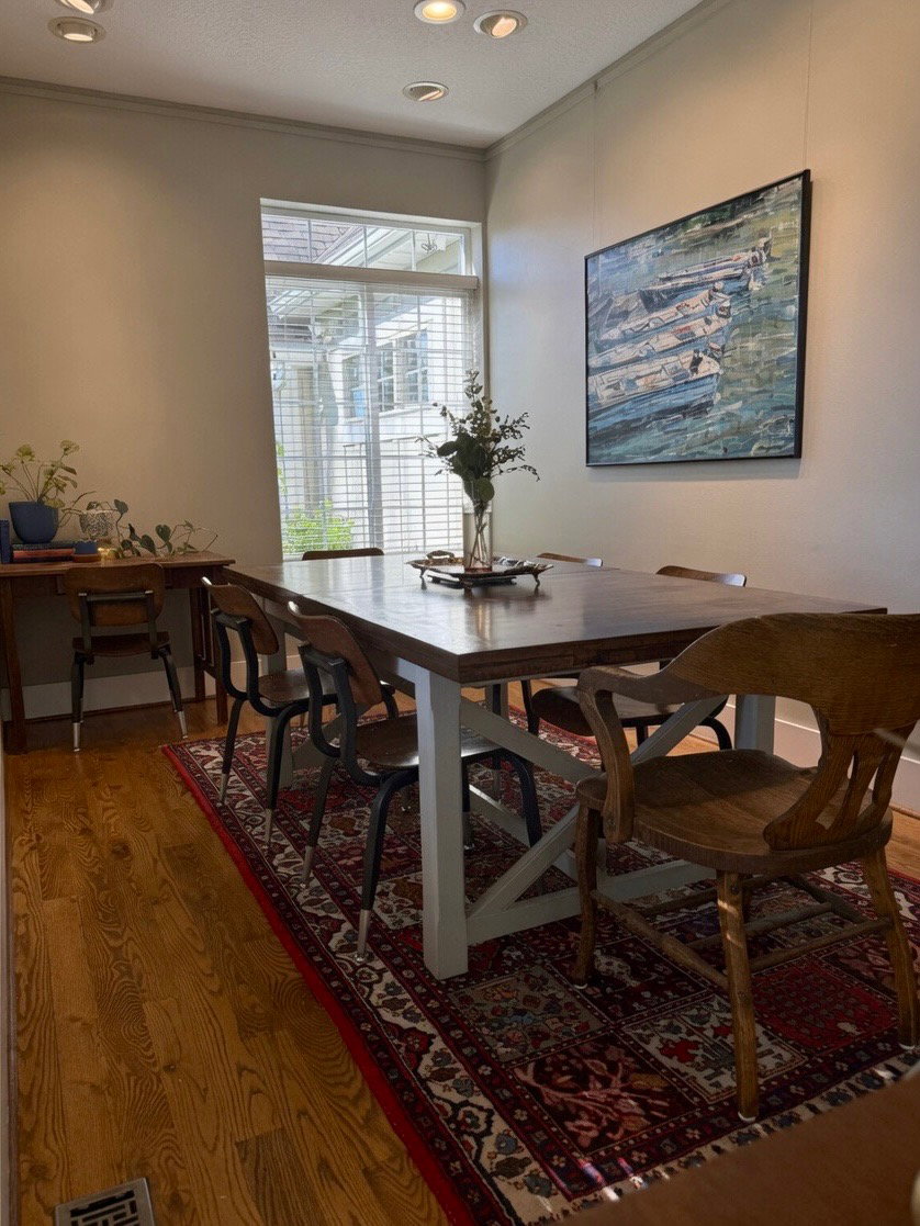 Dining area featuring hardwood flooring, recessed lighting, crown molding, and a window with plantation shutters