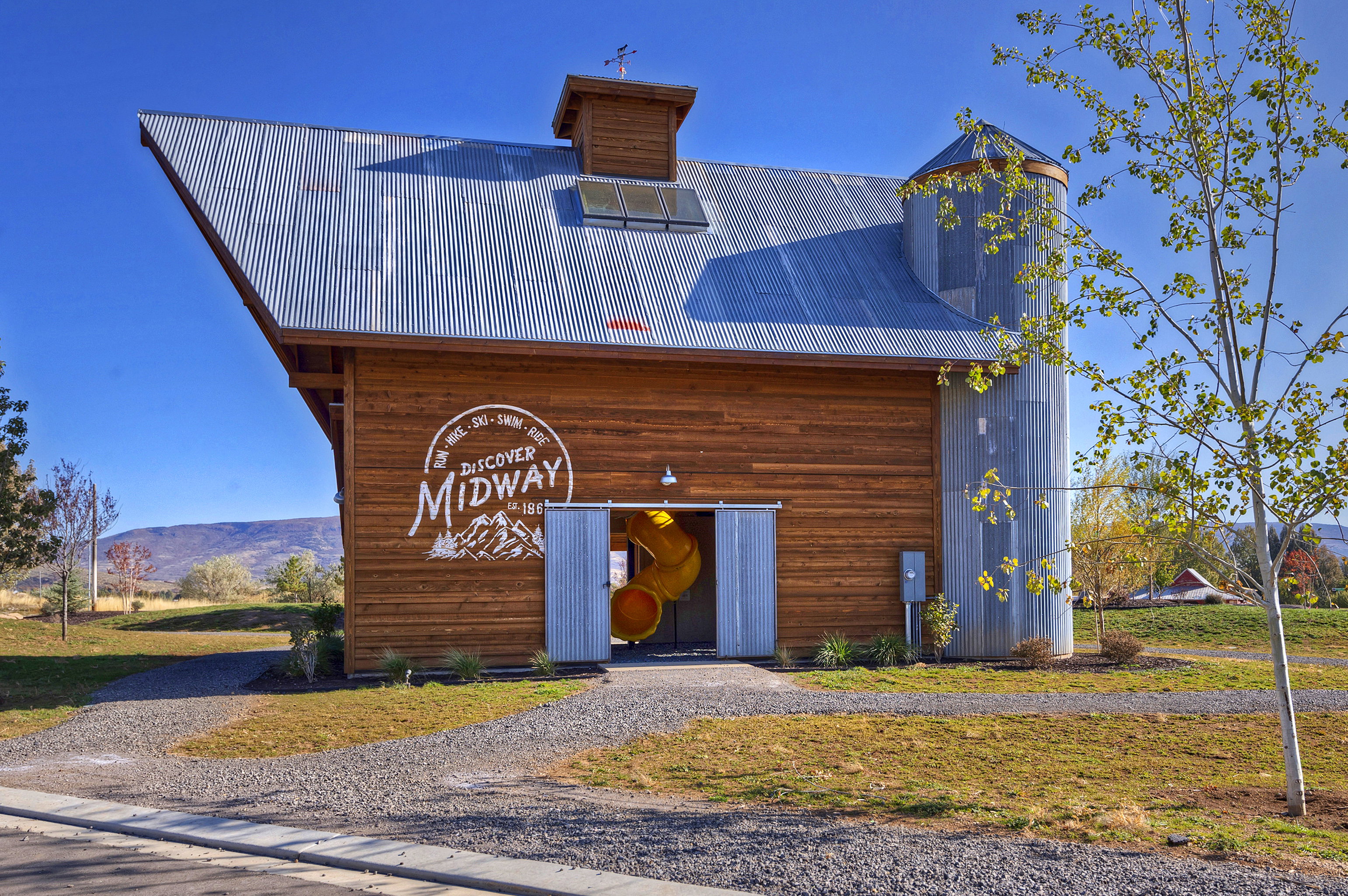 Wood-sided structure with a distinctive corrugated metal roof