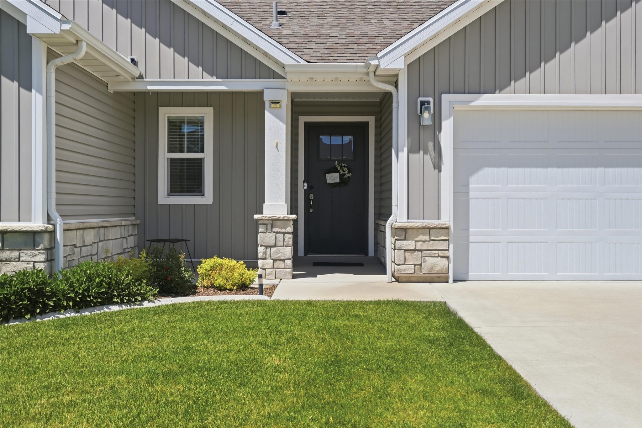 Contemporary exterior featuring horizontal siding and vertical board and batten accents