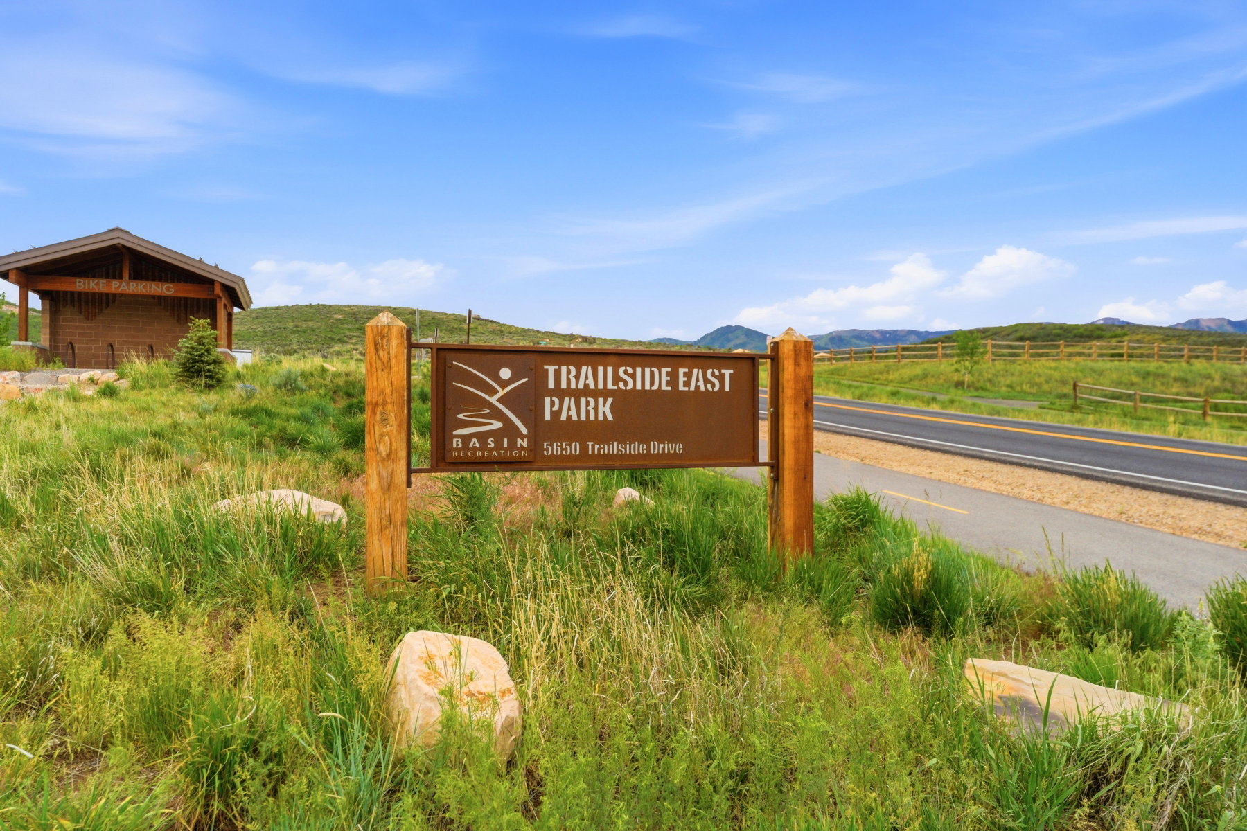 Trailside East Park sign with natural wood posts