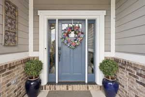 Doorway to property with a porch