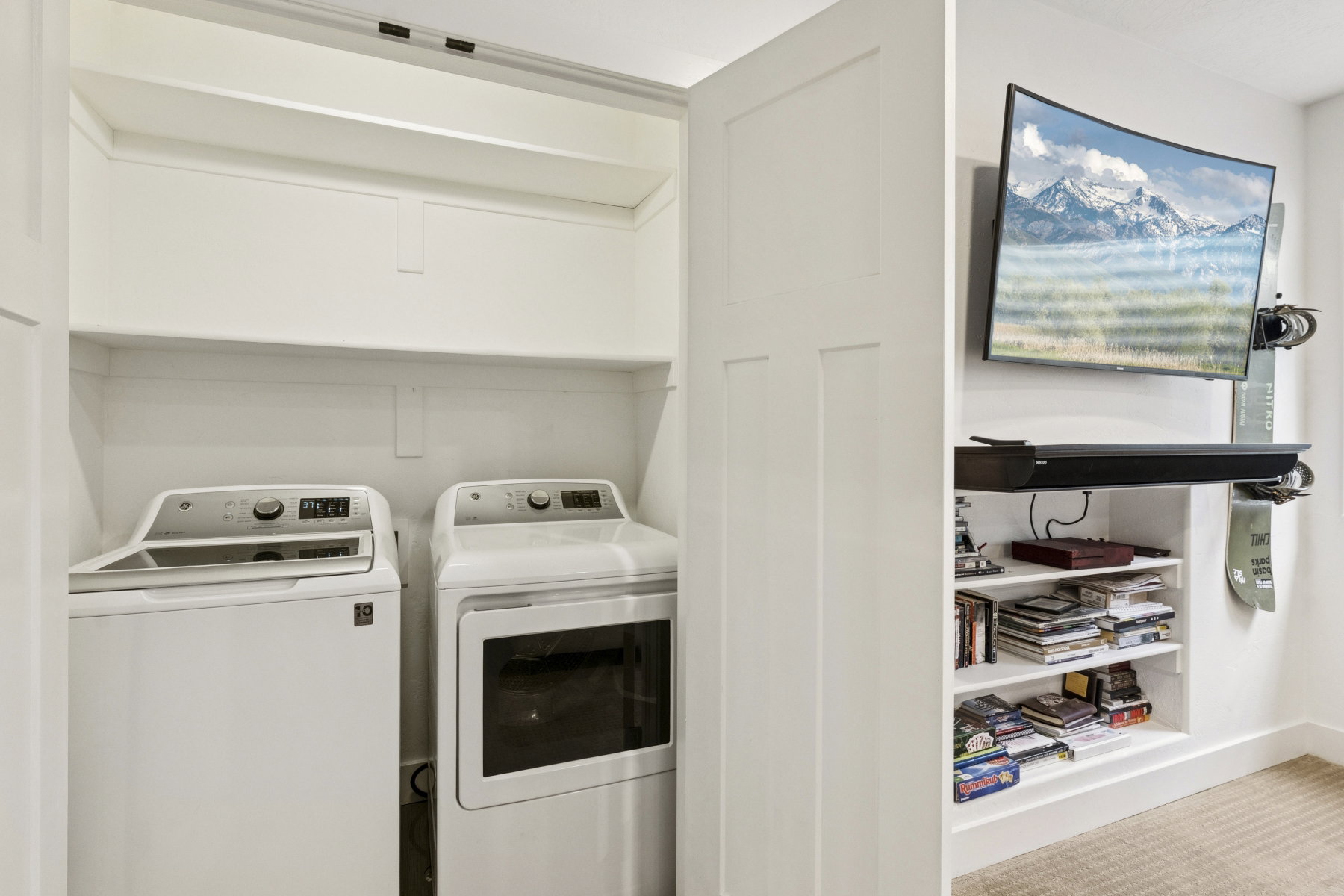 Laundry area with washer and clothes dryer