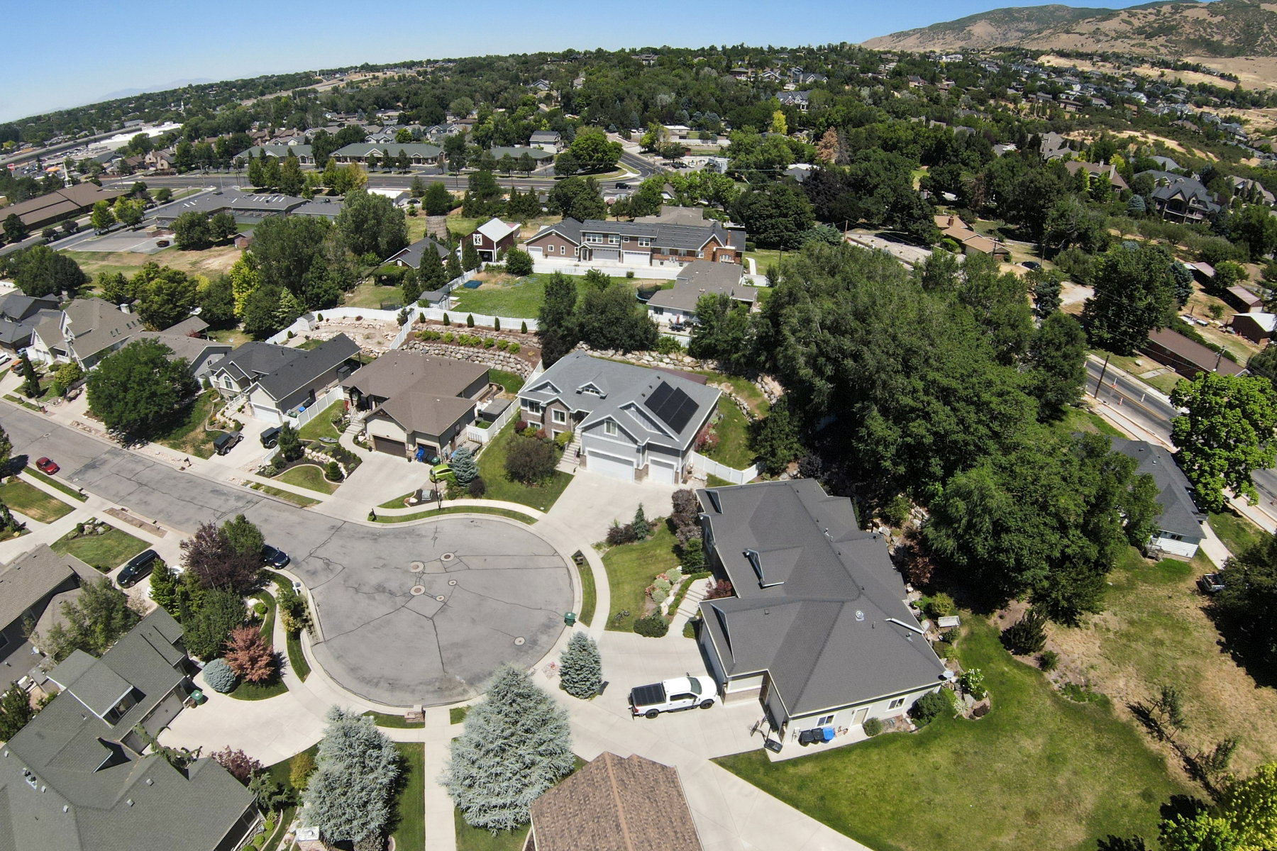 Aerial perspective showcasing residential properties in a developed neighborhood