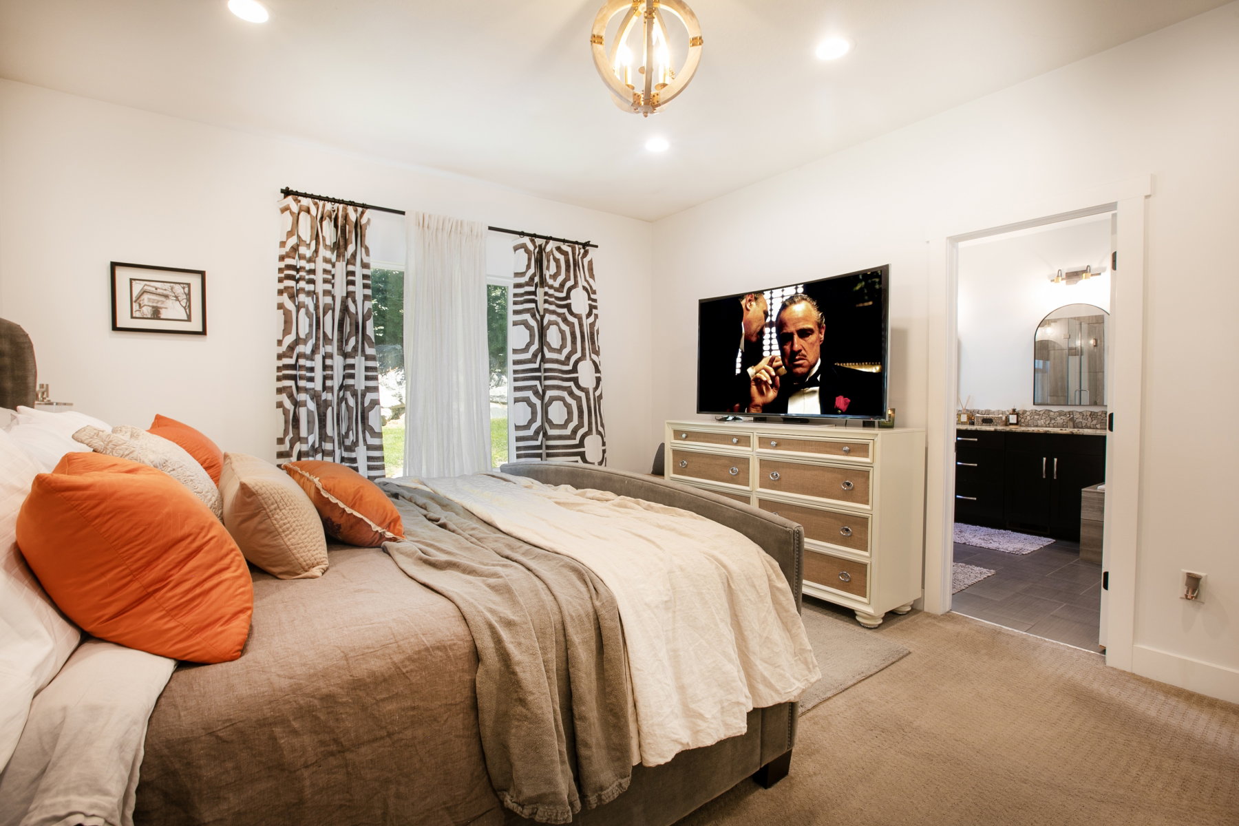 Carpeted room with recessed lighting and a decorative ceiling fixture