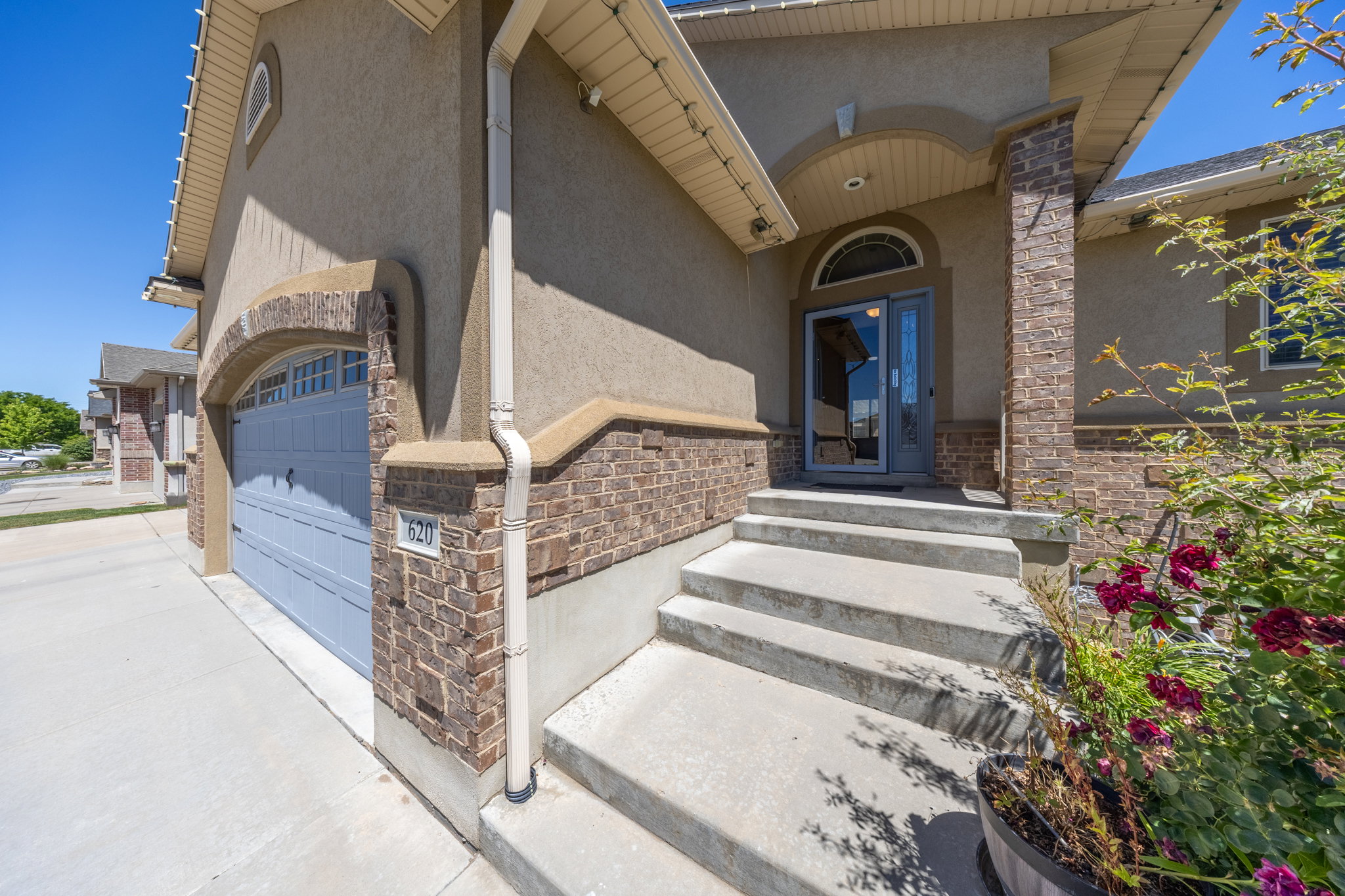 Stucco exterior with stone accents