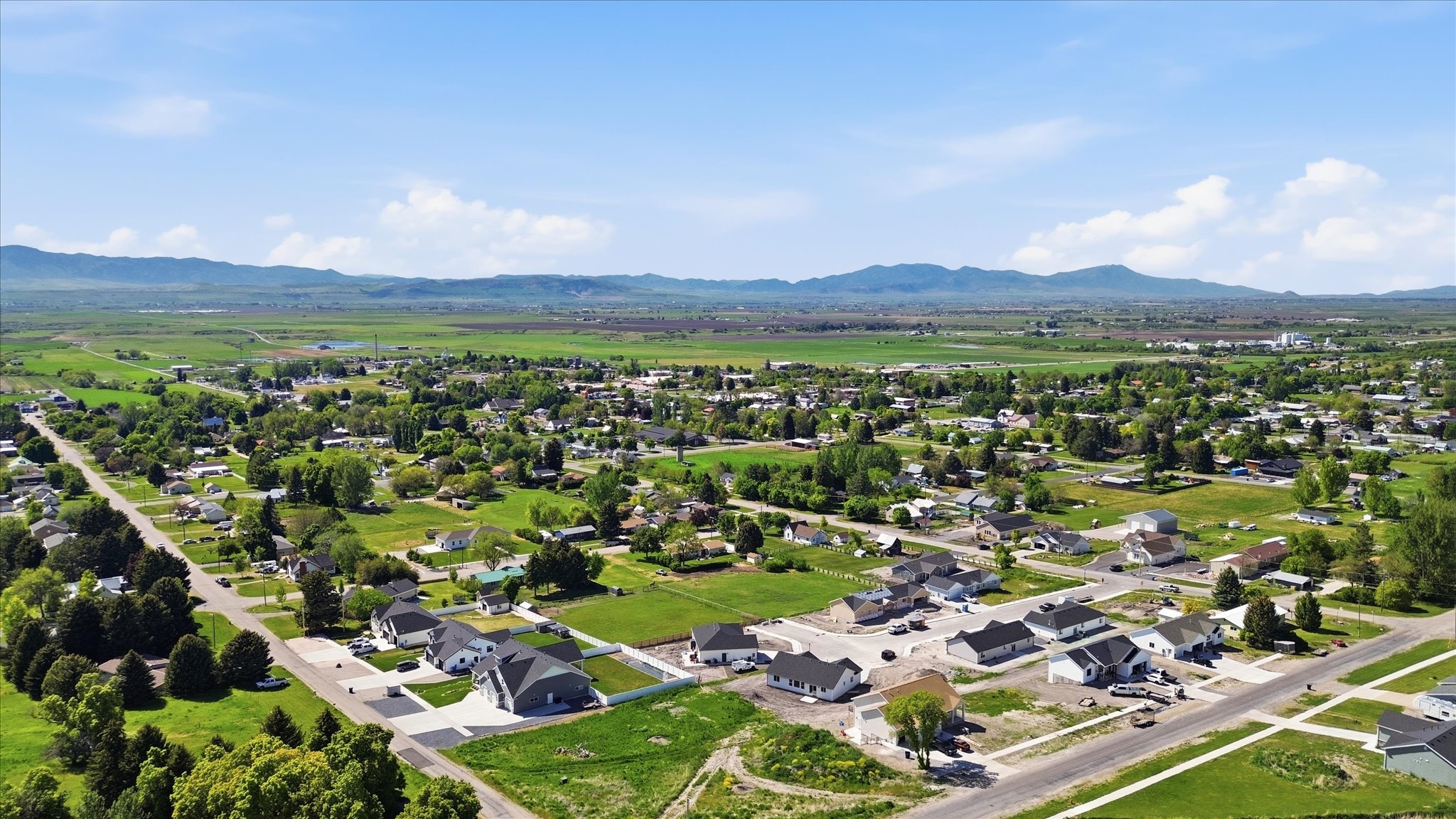 Aerial perspective showcasing a residential development with newly constructed homes