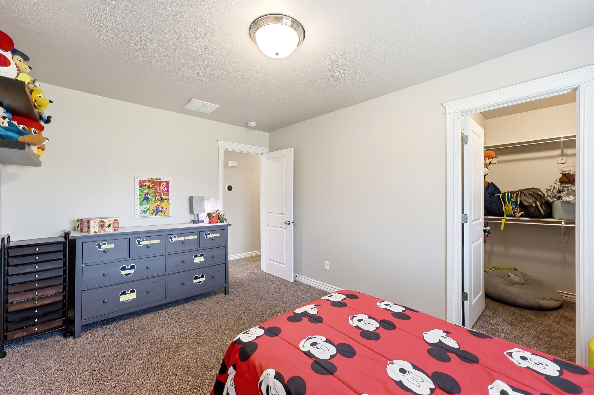 Neutral wall color, carpeted flooring, and white trim