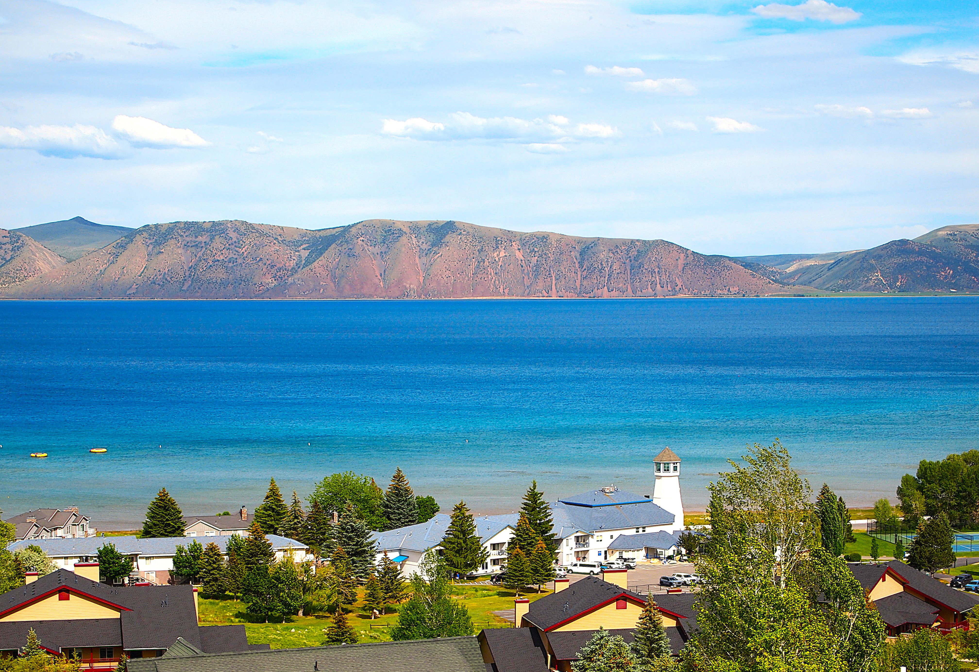 Expansive body of water with distant mountainous terrain