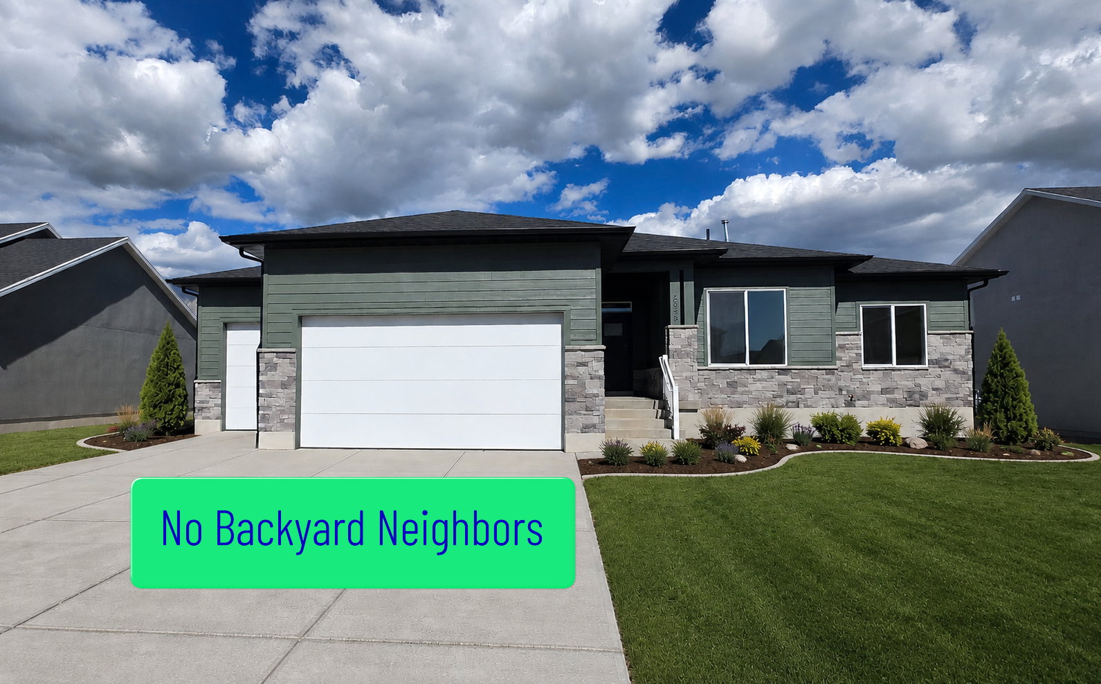 Contemporary exterior featuring green siding and stone veneer accents