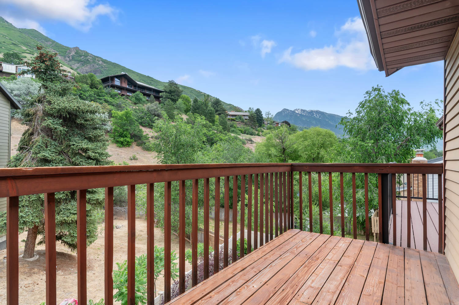 Primary bedroom balcony with mountain views