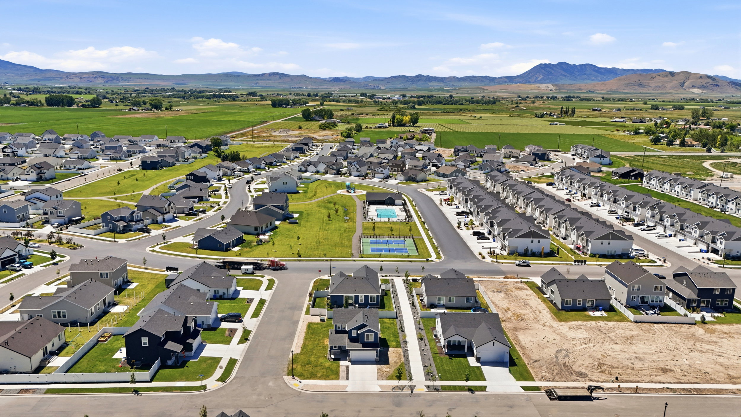 Expansive residential development featuring single-family homes and townhouses