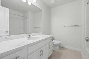 Bathroom vanity featuring an integrated sink, polished chrome faucet, and quartz-finish countertop