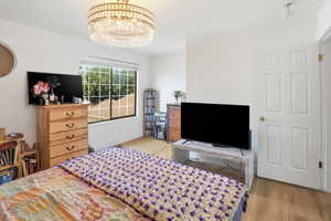 Bright white walls complement wood-finish flooring