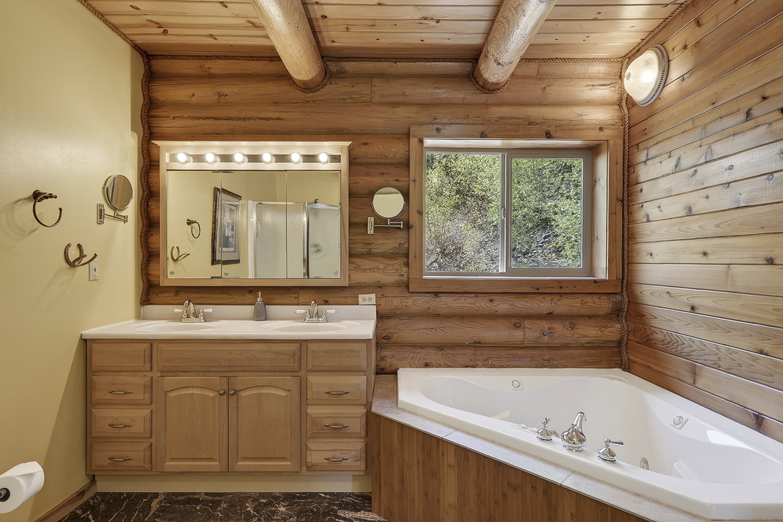 Natural wood paneling and exposed ceiling beams create a rustic aesthetic