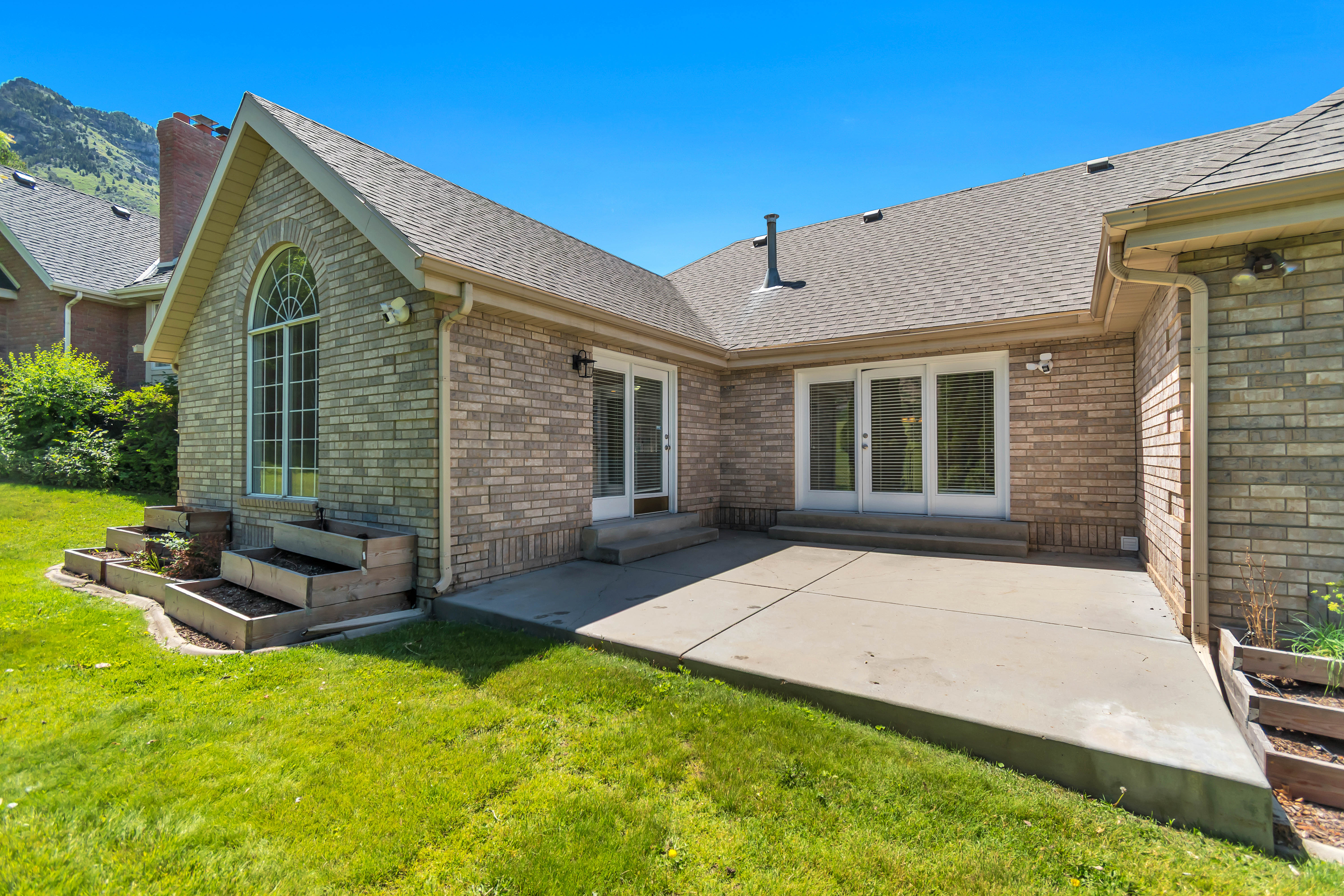 Brick exterior with a gabled roofline