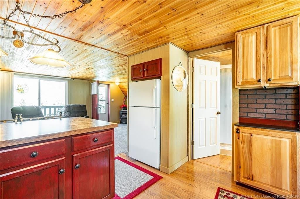 Wood-paneled ceilings with recessed lighting