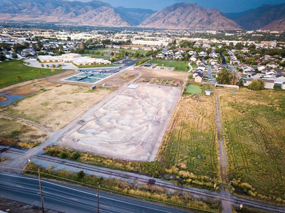 Expansive land parcel featuring varied terrain including cleared areas and natural vegetation