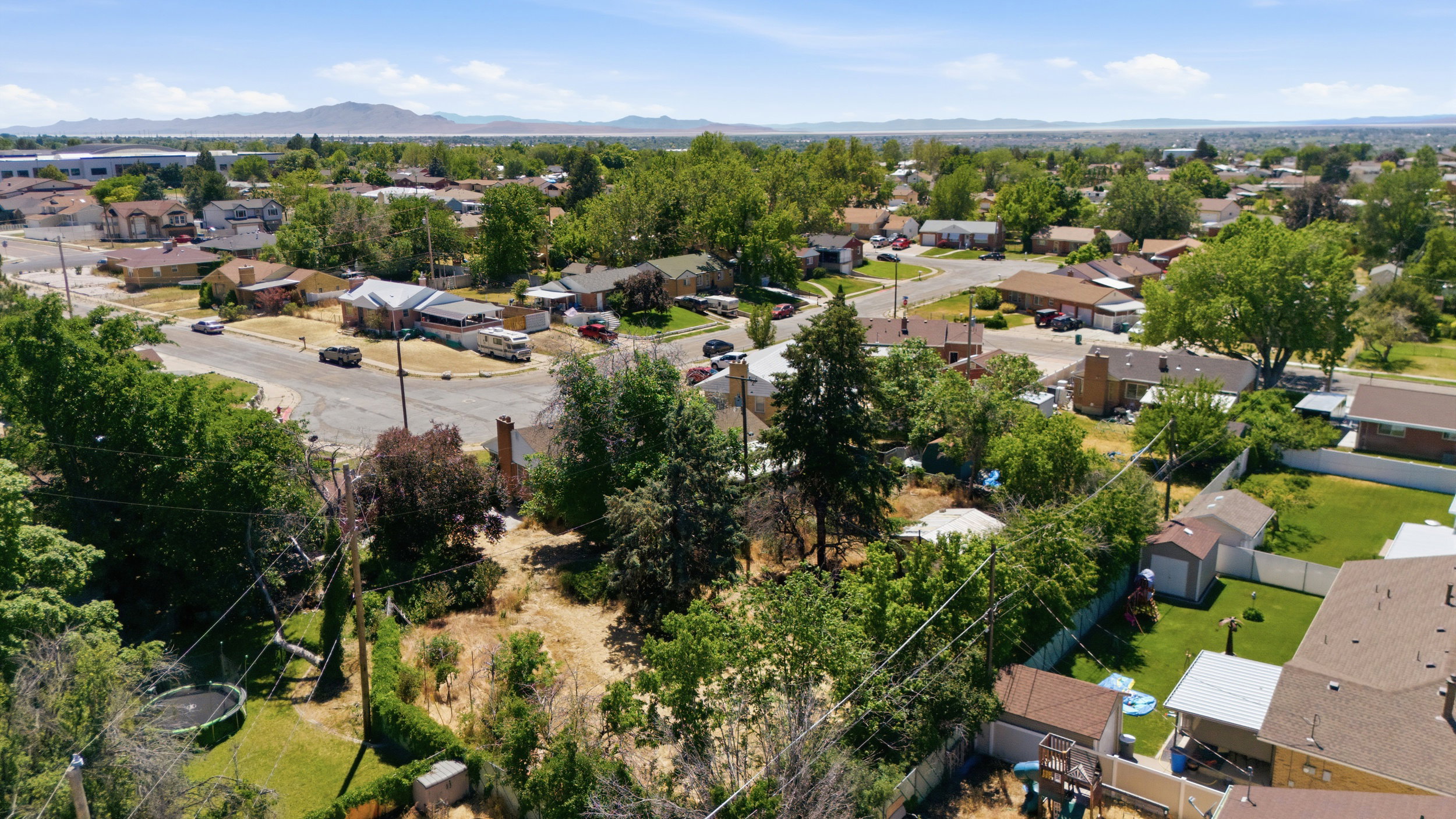 Expansive aerial perspective showcasing a residential area with varied housing styles
