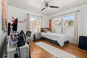 Room with three windows showcasing mountain scenery