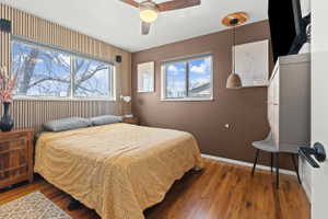 Hardwood flooring and custom vertical slat wall paneling