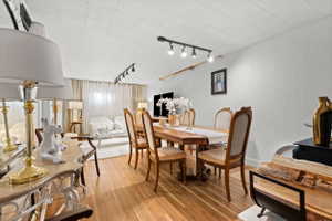 Hardwood flooring throughout the dining area and living space