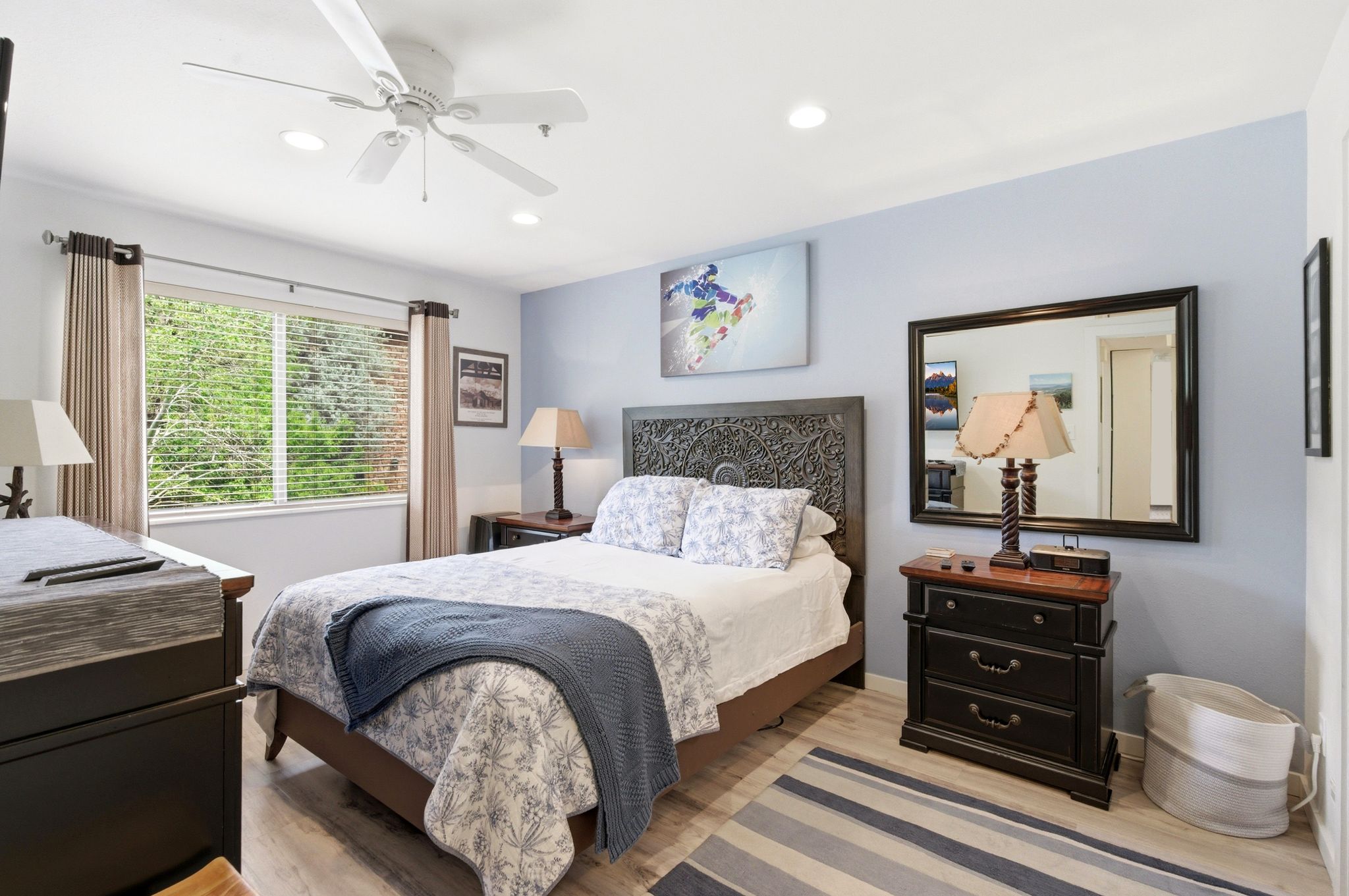 Bedroom featuring wood-finish flooring, recessed lighting, and a ceiling fan