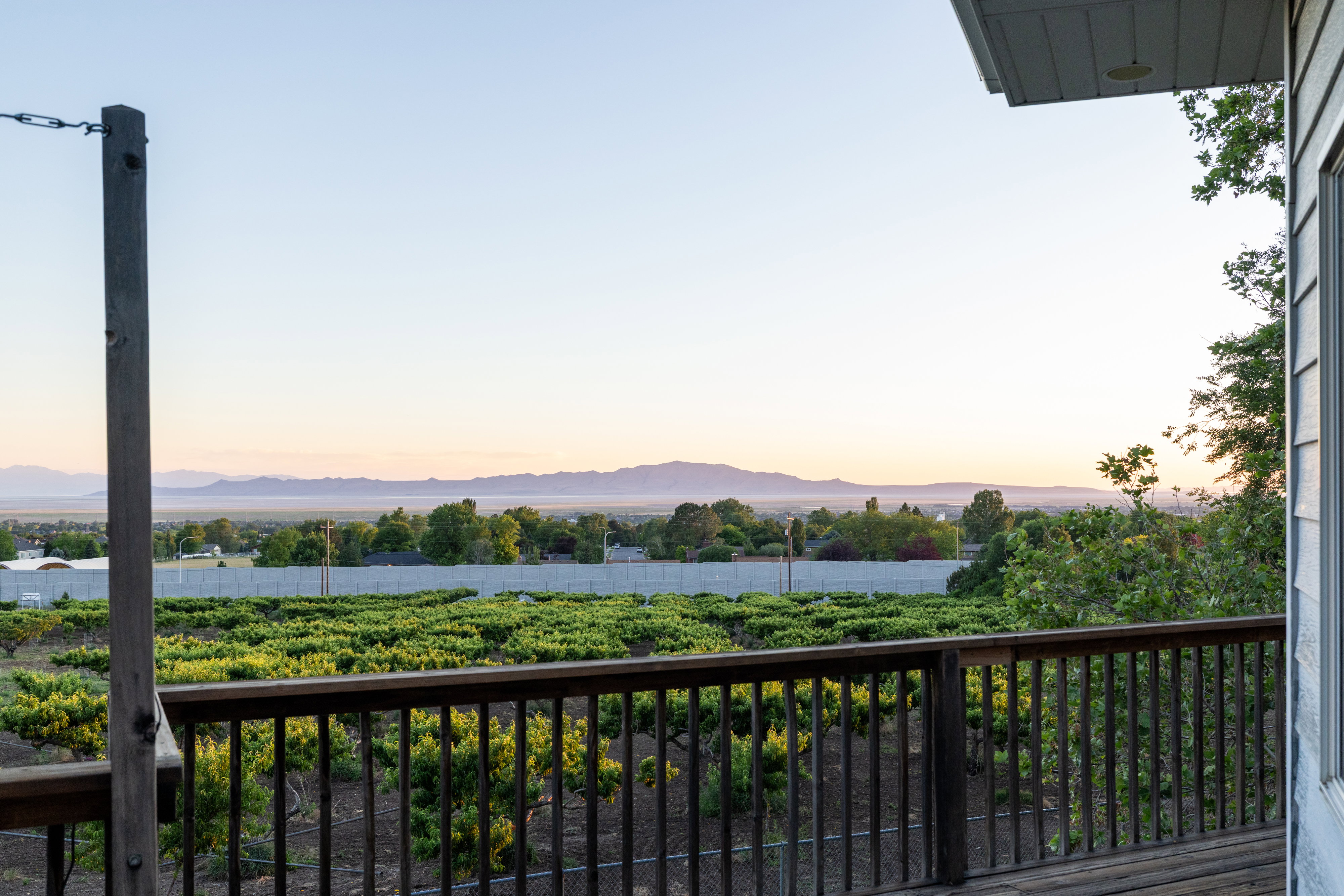Expansive outdoor deck with wood railing