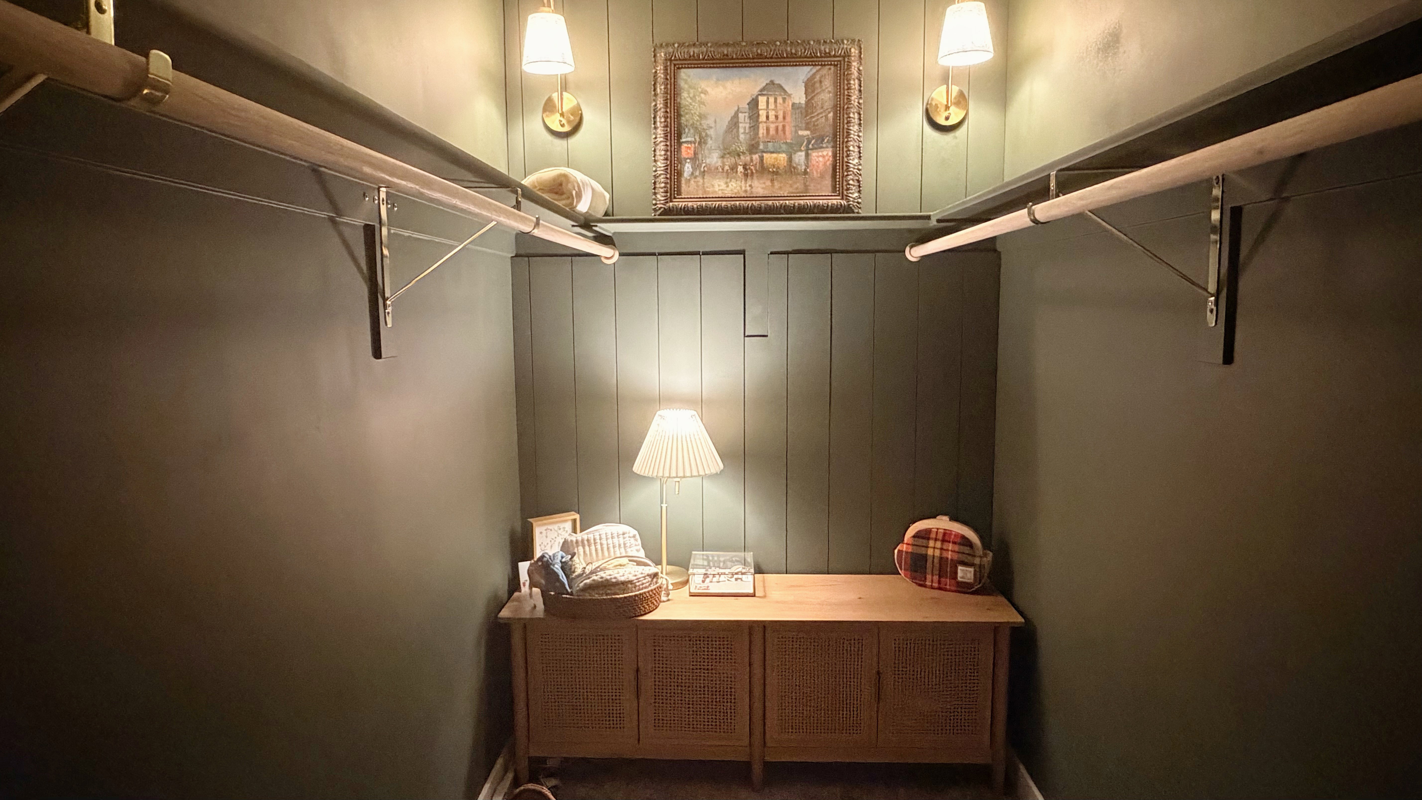 Built-in closet system with upper shelving and hanging rods