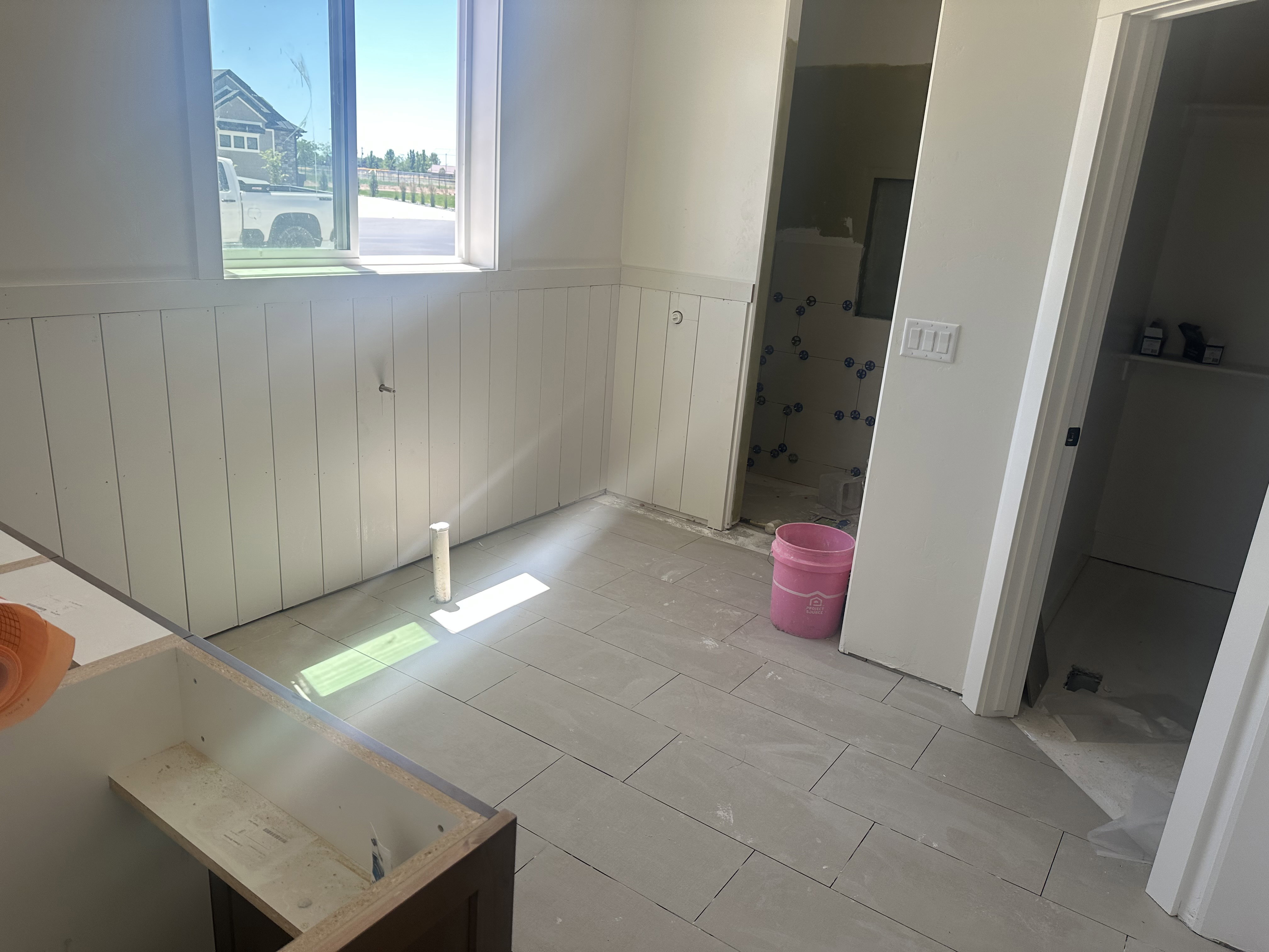 Light tile flooring with a neutral finish