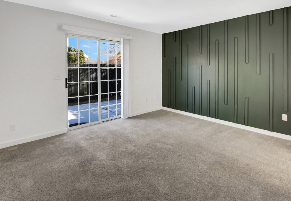 Sliding glass patio door opening to outdoor space