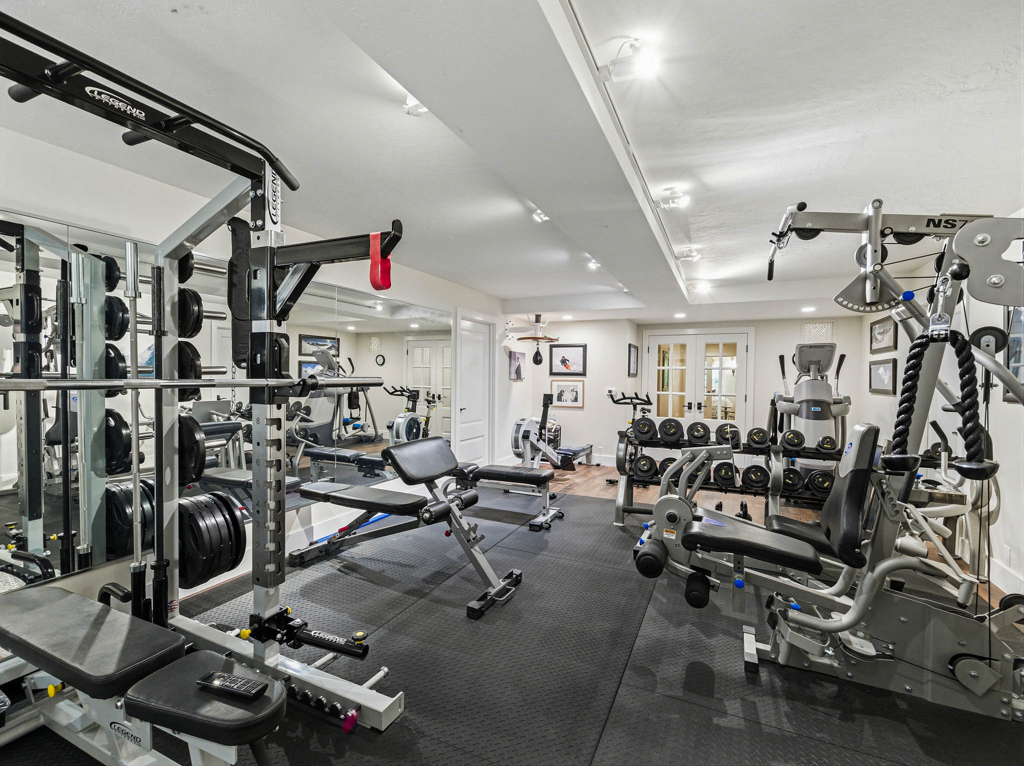 Dedicated fitness space featuring rubberized flooring
