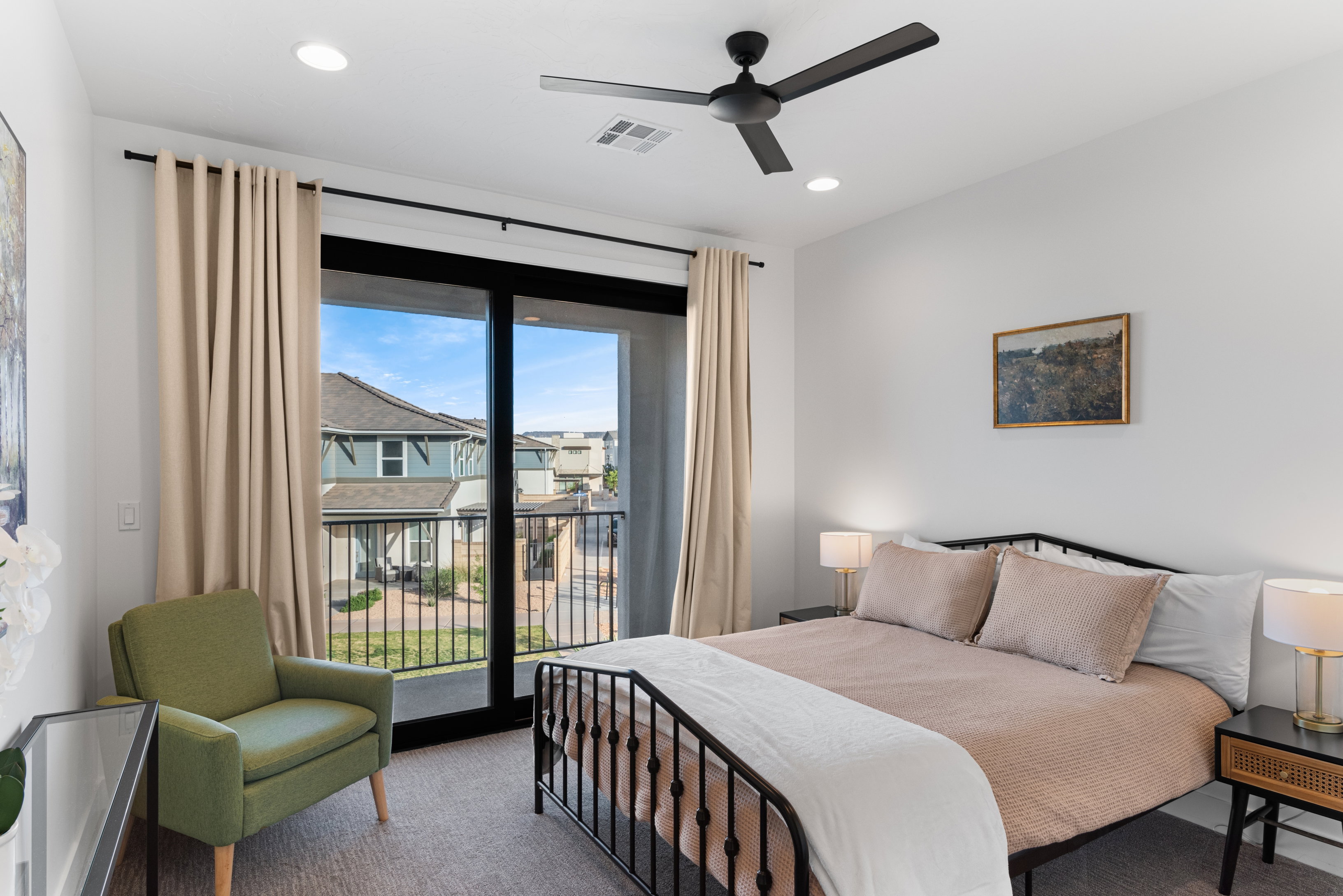 Bedroom featuring a large sliding glass door with balcony access, recessed lighting, and a ceiling fan