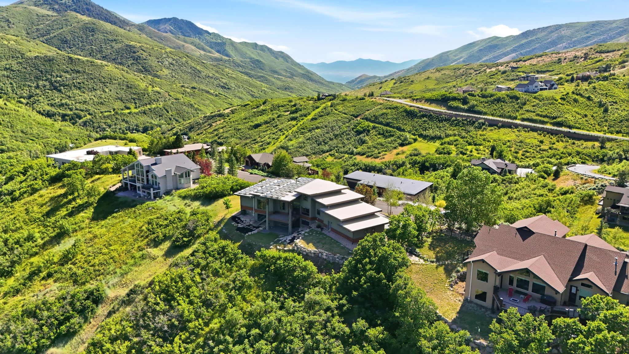 Terraced property with multiple levels and mountain scenery