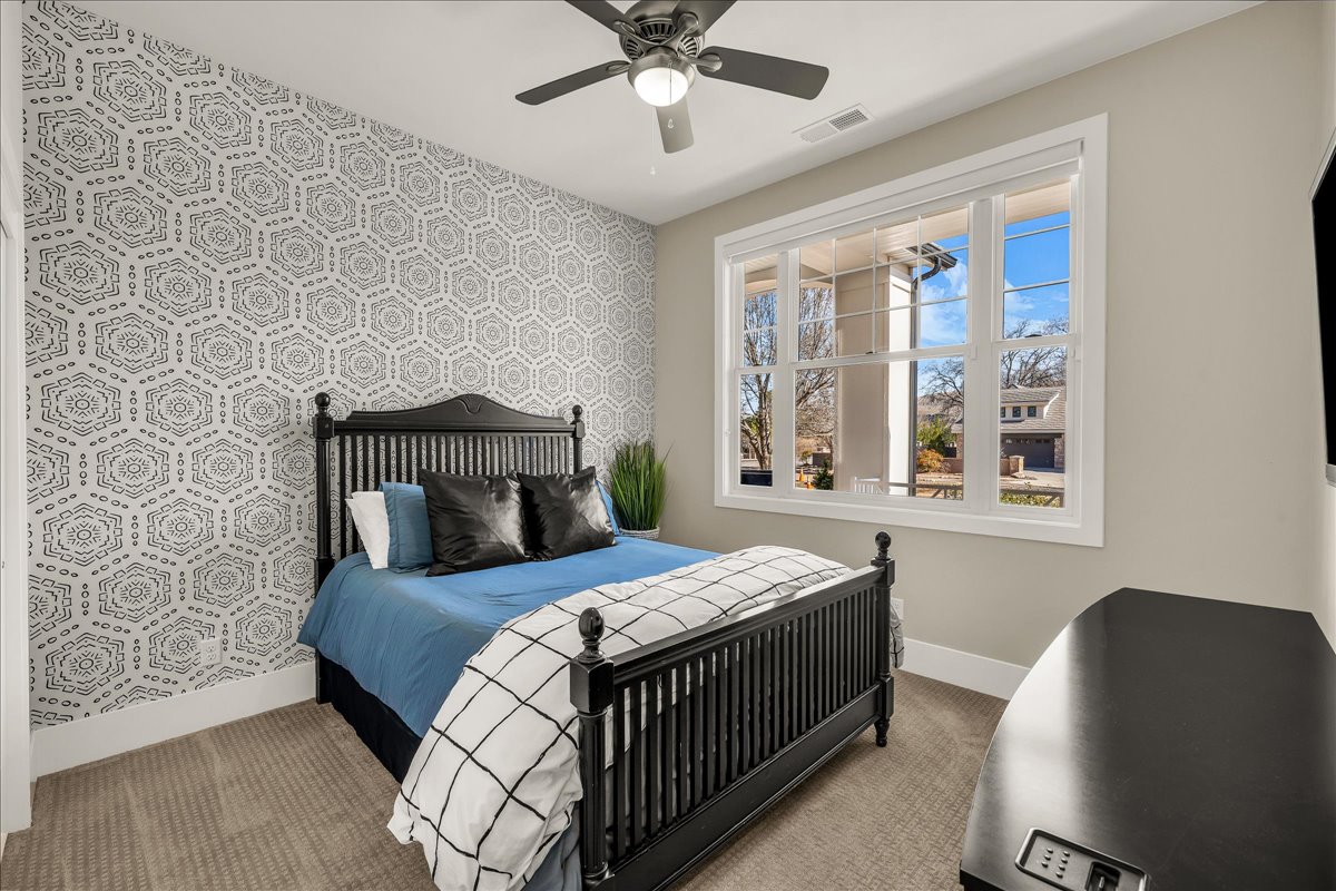 Neutral wall paint complemented by a patterned accent wall