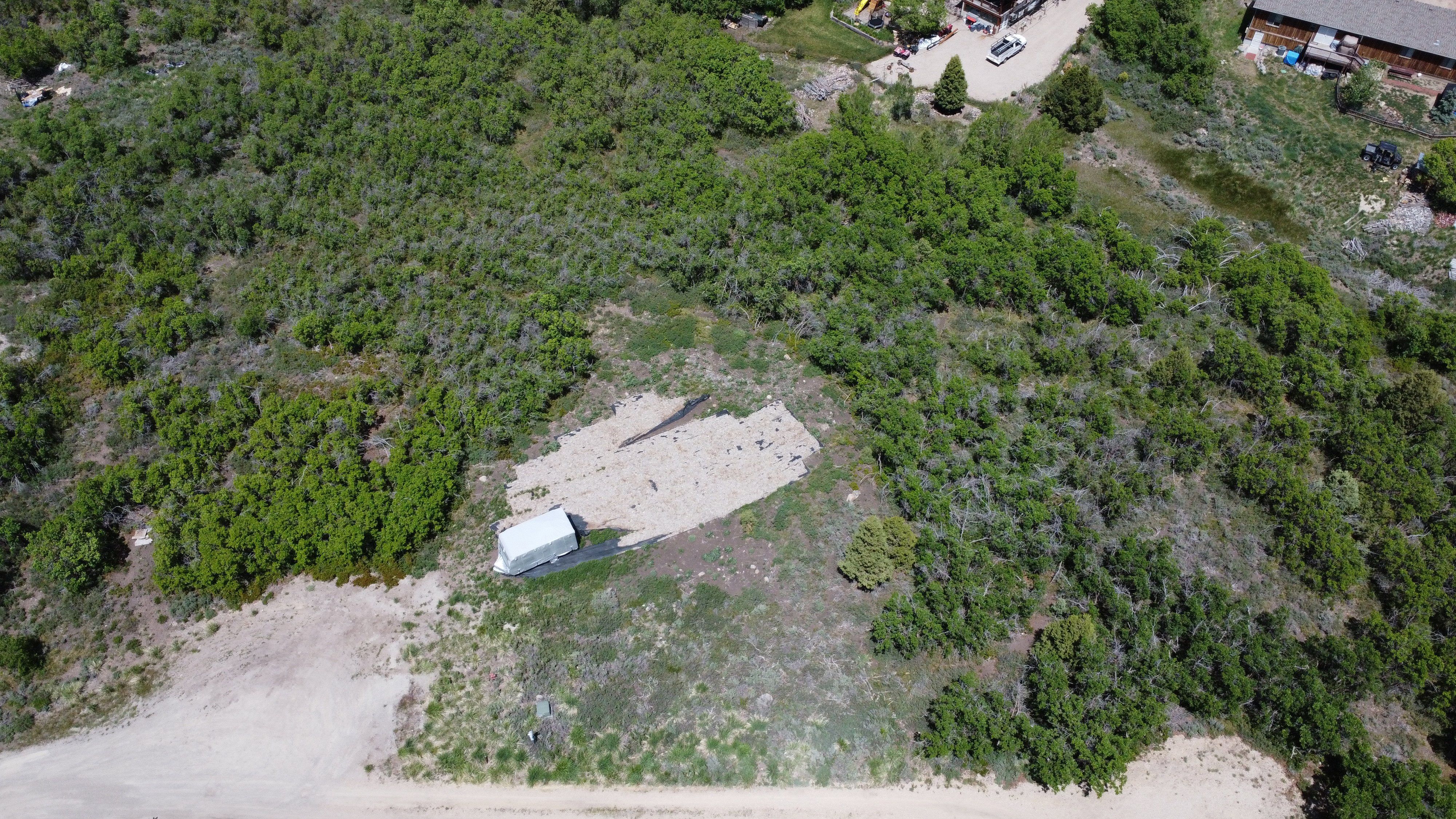 Expansive undeveloped land featuring natural terrain and abundant greenery