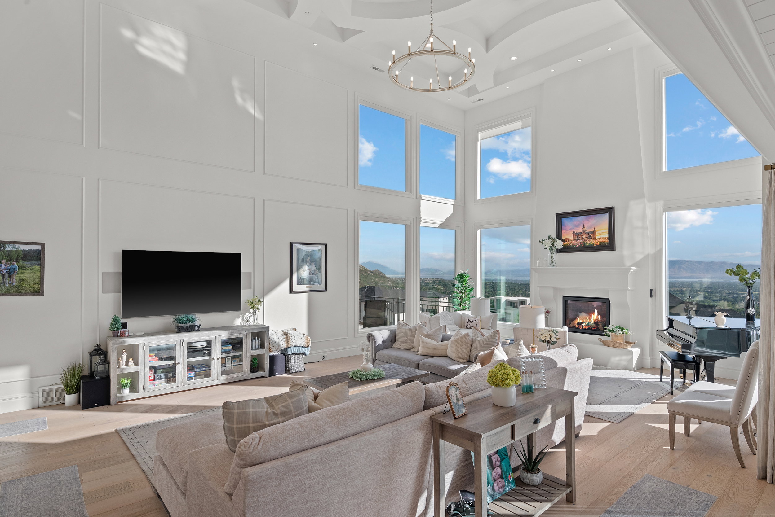 Soaring ceilings with decorative trim work and a tiered tray design