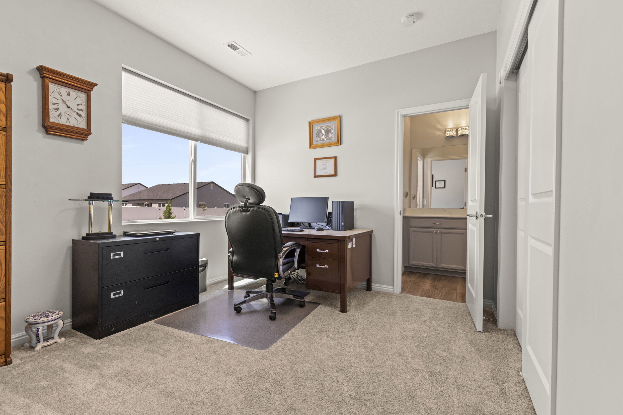 Neutral tone wall paint with light-colored carpeting