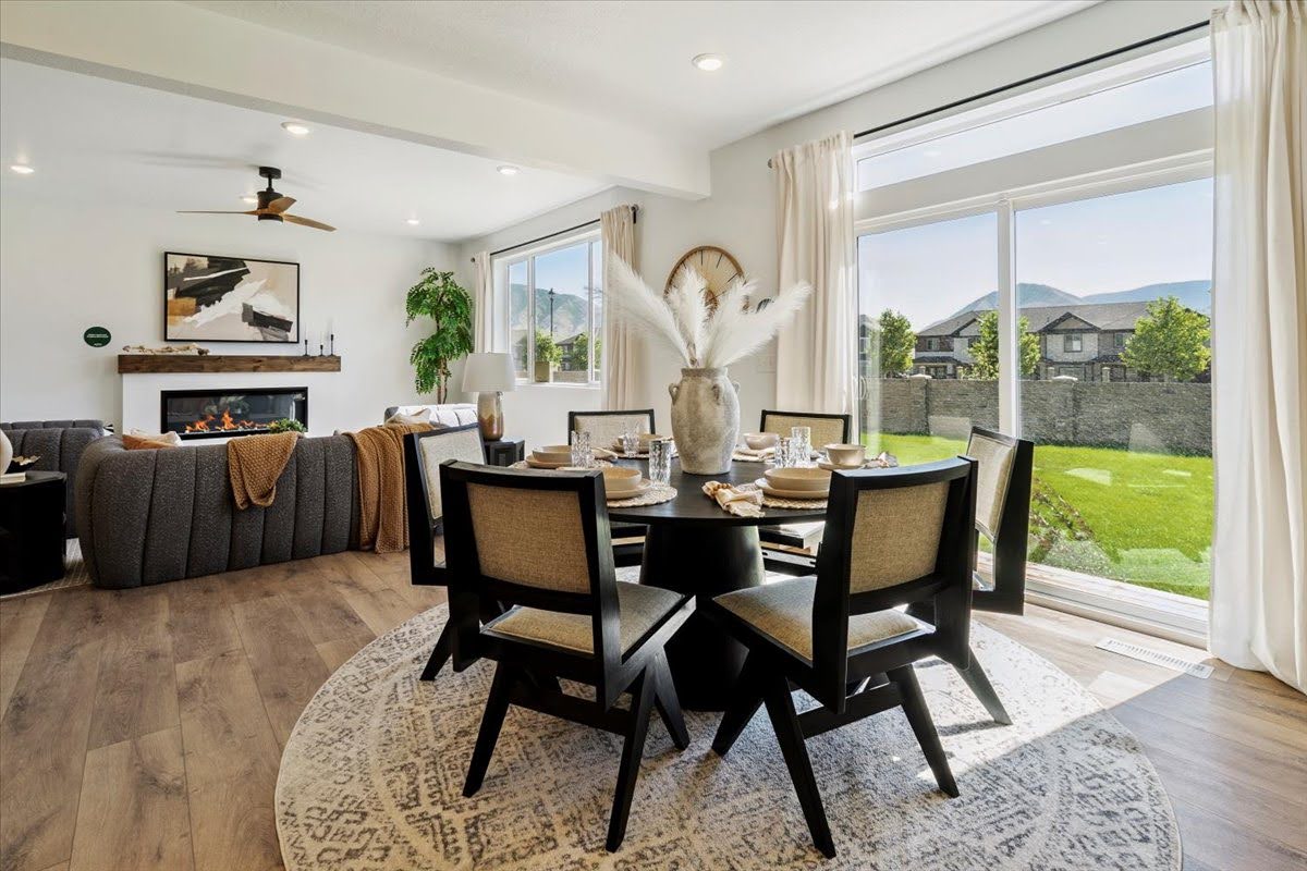 Open concept interior featuring wide plank wood-finish flooring