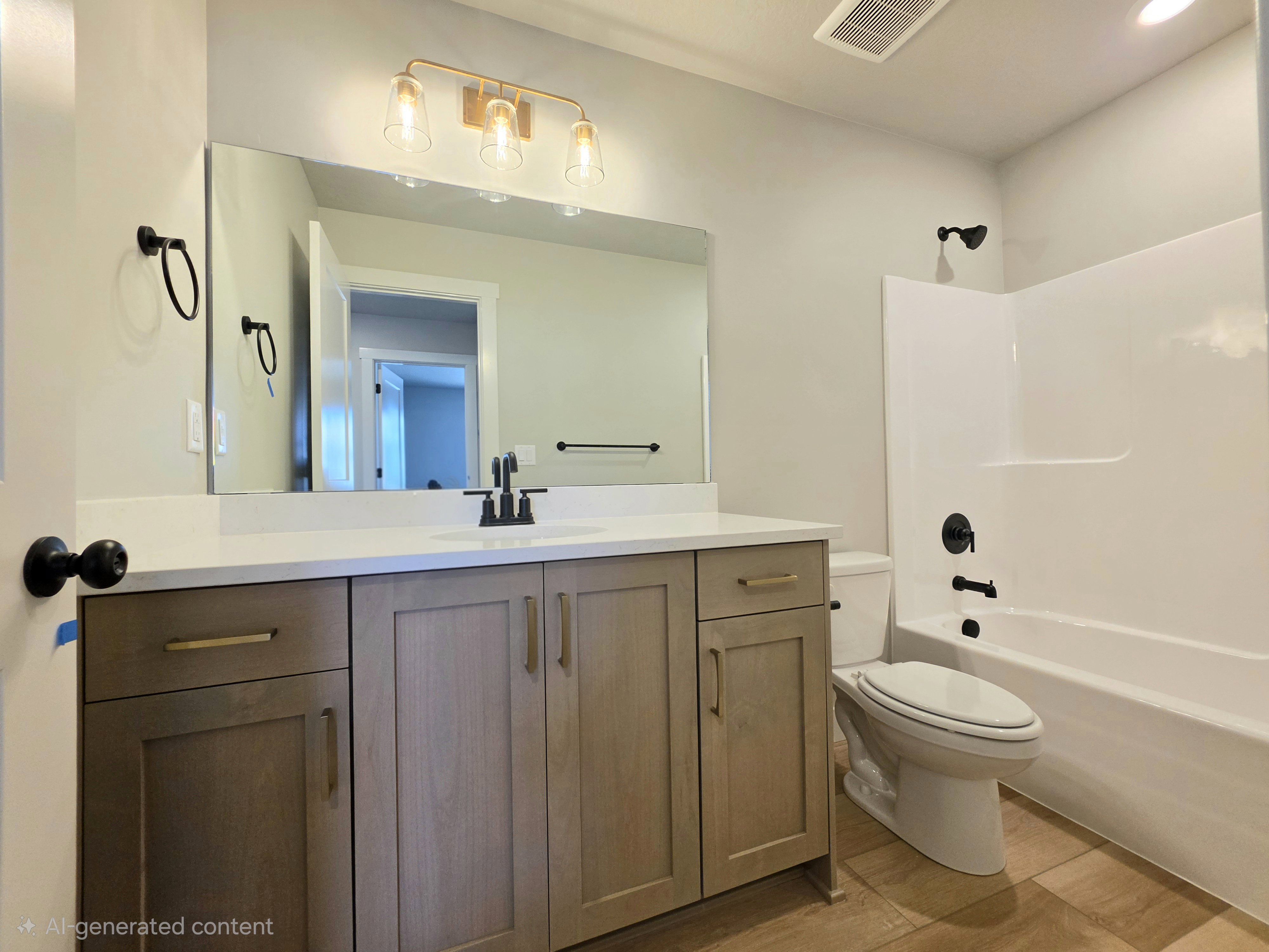 Full bathroom featuring a single vanity with stone-finish countertop, undermount sink, and wood-finish cabinetry