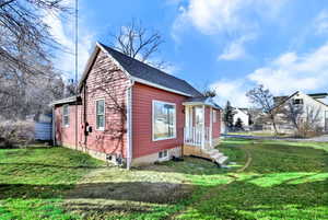 Red siding exterior with white trim